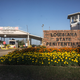 The entrance of Angola Prison, Louisiana. The Louisiana State Penitentiary, also known as Angola, and nicknamed the “Alcatraz of the South” and “The Farm” is a maximum-security prison farm in Louisiana operated by the Louisiana Department of Public Safety & Corrections. It is named Angola after the former plantation that occupied this territory, which was named for the African country that was the origin of many enslaved Africans brought to Louisiana in slavery times. Angola Prison is the largest maximum-security prison in the United States[with 6,300 prisoners and 1,800 staff, including corrections officers, janitors, maintenance, and wardens. It is located on an 18,000-acre (7,300 ha) property that was previously known as the Angola Plantations and bordered on three sides by the Mississippi River.